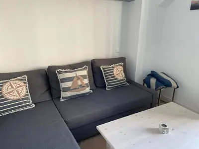 Ein Sitzbereich in der Unterkunft Apartment Boddenkieker