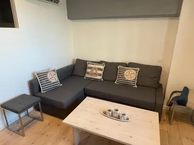 Ein Sitzbereich in der Unterkunft Apartment Boddenkieker