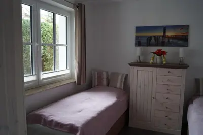 Ein Bett oder Betten in einem Zimmer der Unterkunft FW Skipper