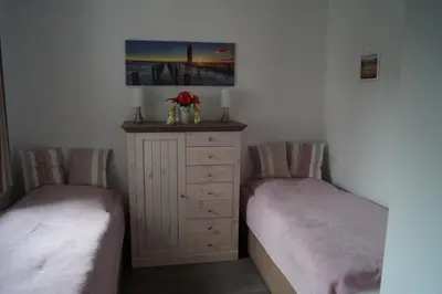 Ein Bett oder Betten in einem Zimmer der Unterkunft FW Skipper