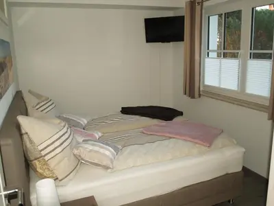 Ein Bett oder Betten in einem Zimmer der Unterkunft FW Skipper