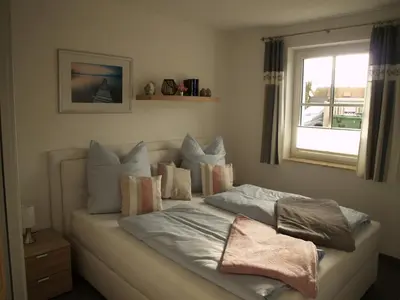 Ein Bett oder Betten in einem Zimmer der Unterkunft FW Lotse