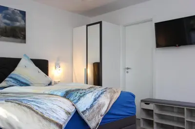 Ein Bett oder Betten in einem Zimmer der Unterkunft Kleine Veranda