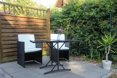 Ein Garten an der Unterkunft Kleine Veranda