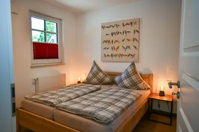 Ein Bett oder Betten in einem Zimmer der Unterkunft Zum Klabautermann