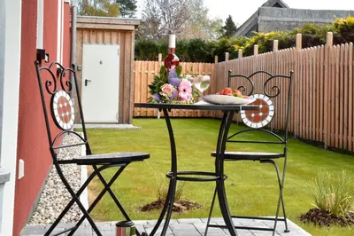 Ein Garten an der Unterkunft Zum Klabautermann