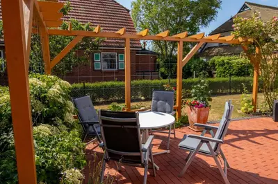 Ein Garten an der Unterkunft Ferienwohnungen zur Friedenseiche