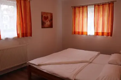 Ein Bett oder Betten in einem Zimmer der Unterkunft FeWo Marion