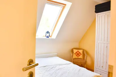 Ein Bett oder Betten in einem Zimmer der Unterkunft Ostsee Auszeit