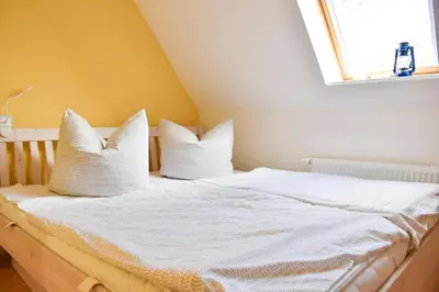 Ein Bett oder Betten in einem Zimmer der Unterkunft Ostsee Auszeit