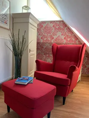 Ein Sitzbereich in der Unterkunft Ferienhaus Am Strand