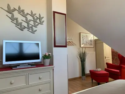 TV/Unterhaltungsangebot in der Unterkunft Ferienhaus Am Strand
