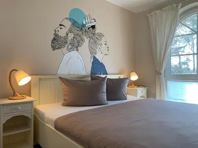 Ein Bett oder Betten in einem Zimmer der Unterkunft Ferienhaus Am Strand
