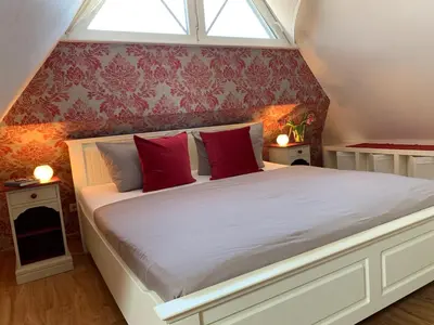 Ein Bett oder Betten in einem Zimmer der Unterkunft Ferienhaus Am Strand