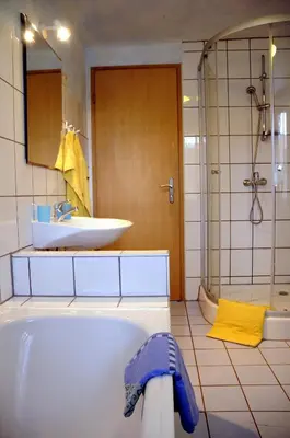 Ein Badezimmer in der Unterkunft Ferienhaus 3 Zi im ART.Quartier