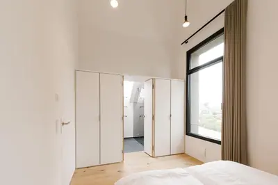 Ein Bett oder Betten in einem Zimmer der Unterkunft DIEVIER Musikhaus DasDritte