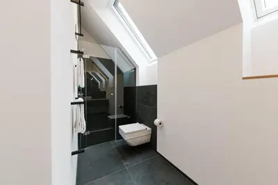 Ein Badezimmer in der Unterkunft DIEVIER Filmhaus DasErste