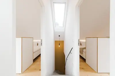 Ein Bett oder Betten in einem Zimmer der Unterkunft DIEVIER Literaturhaus DasZweite