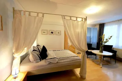 Ein Bett oder Betten in einem Zimmer der Unterkunft Luxus-Ferienhaus auf Reiterhof ART.Quartier
