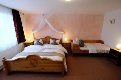 Ein Bett oder Betten in einem Zimmer der Unterkunft Luxus-Ferienhaus auf Reiterhof ART.Quartier