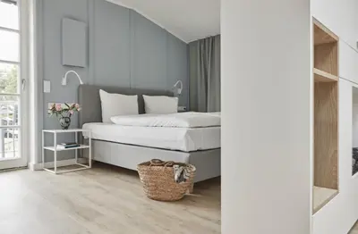 Ein Bett oder Betten in einem Zimmer der Unterkunft Strandglück Prerow