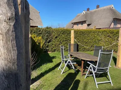 Ein Garten an der Unterkunft Dat Smucke Reethus Dachgeschoss