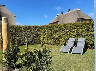 Ein Garten an der Unterkunft Dat Smucke Reethus Erdgeschoss
