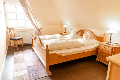 Ein Bett oder Betten in einem Zimmer der Unterkunft Hotel Haferland