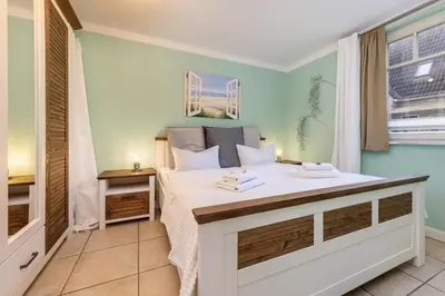 Ein Bett oder Betten in einem Zimmer der Unterkunft Am Ostseestrand