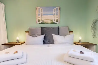 Ein Bett oder Betten in einem Zimmer der Unterkunft Am Ostseestrand