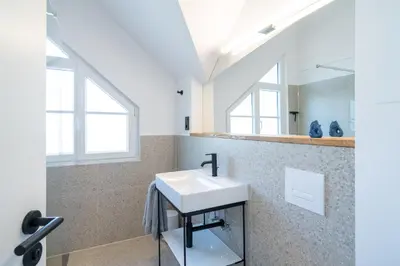 Ein Badezimmer in der Unterkunft Apartment Blausand
