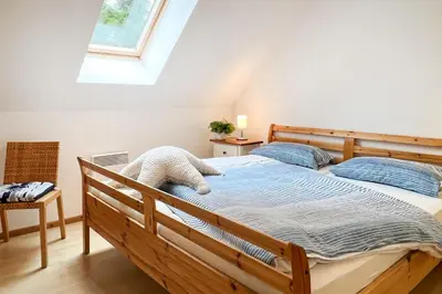 Ein Bett oder Betten in einem Zimmer der Unterkunft Alter Schwede Haus 2