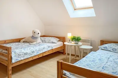 Ein Bett oder Betten in einem Zimmer der Unterkunft Alter Schwede Haus 2