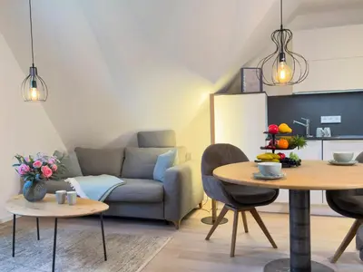 Ein Sitzbereich in der Unterkunft Düne 7 Apartment 7 05