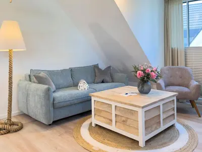 Ein Sitzbereich in der Unterkunft Düne 7 Apartment 7 06