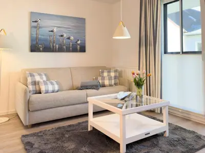 Ein Sitzbereich in der Unterkunft Düne 7 Apartment 7A 02