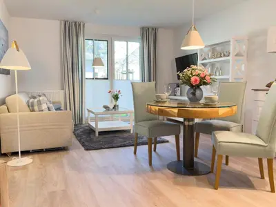 Ein Sitzbereich in der Unterkunft Düne 7 Apartment 7A 02