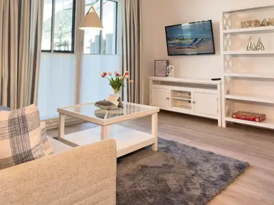 Ein Sitzbereich in der Unterkunft Düne 7 Apartment 7A 02