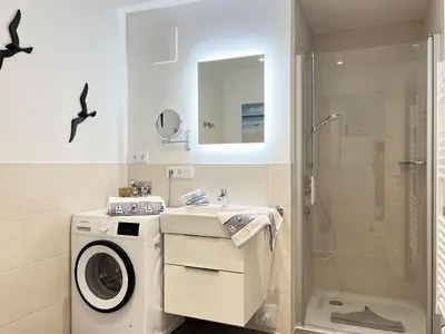 Ein Badezimmer in der Unterkunft Düne 7 Apartment 7A 02