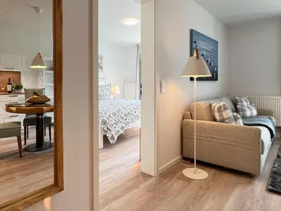 Ein Bett oder Betten in einem Zimmer der Unterkunft Düne 7 Apartment 7A 02