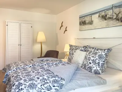 Ein Bett oder Betten in einem Zimmer der Unterkunft Düne 7 Apartment 7A 02