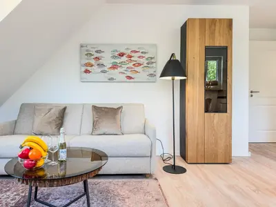 Ein Sitzbereich in der Unterkunft Düne 7 Apartment 7A 04