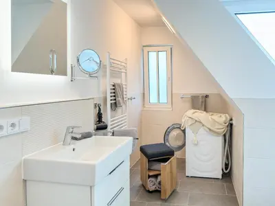 Ein Badezimmer in der Unterkunft Düne 7 Apartment 7A 04