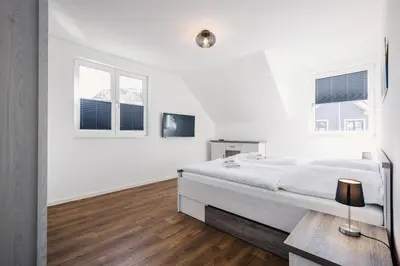Ein Bett oder Betten in einem Zimmer der Unterkunft Ferienhäuser Baltic Lagoon Haus 14a