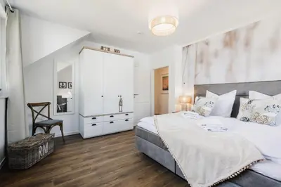 Ein Bett oder Betten in einem Zimmer der Unterkunft Ferienhäuser Baltic Lagoon Haus 12c