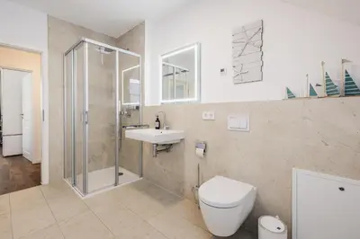 Ein Badezimmer in der Unterkunft Ferienhäuser Baltic Lagoon Haus 12c