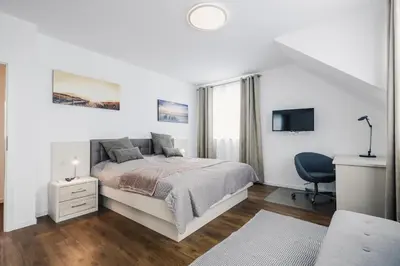 Ein Bett oder Betten in einem Zimmer der Unterkunft Ferienhäuser Baltic Lagoon Haus 16b