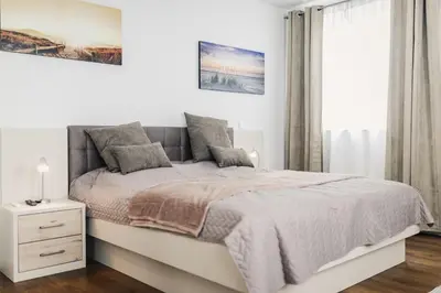 Ein Bett oder Betten in einem Zimmer der Unterkunft Ferienhäuser Baltic Lagoon Haus 16b
