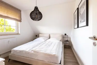 Ein Bett oder Betten in einem Zimmer der Unterkunft Schöne Aussichten