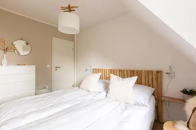 Ein Bett oder Betten in einem Zimmer der Unterkunft Schöne Aussichten